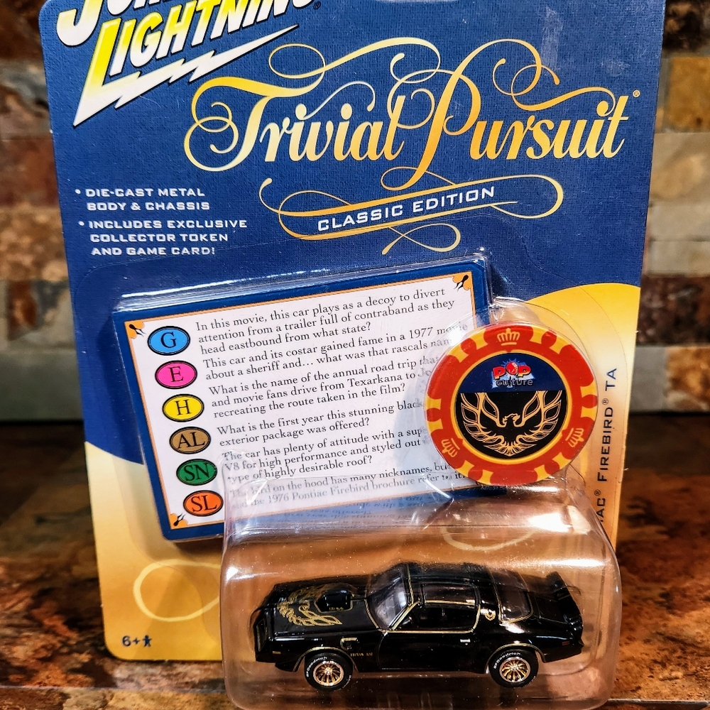 Johnny Lightning Trivia Pursuit • 1997 Pointiac Firebird •Trans Am w/ Poker Chip